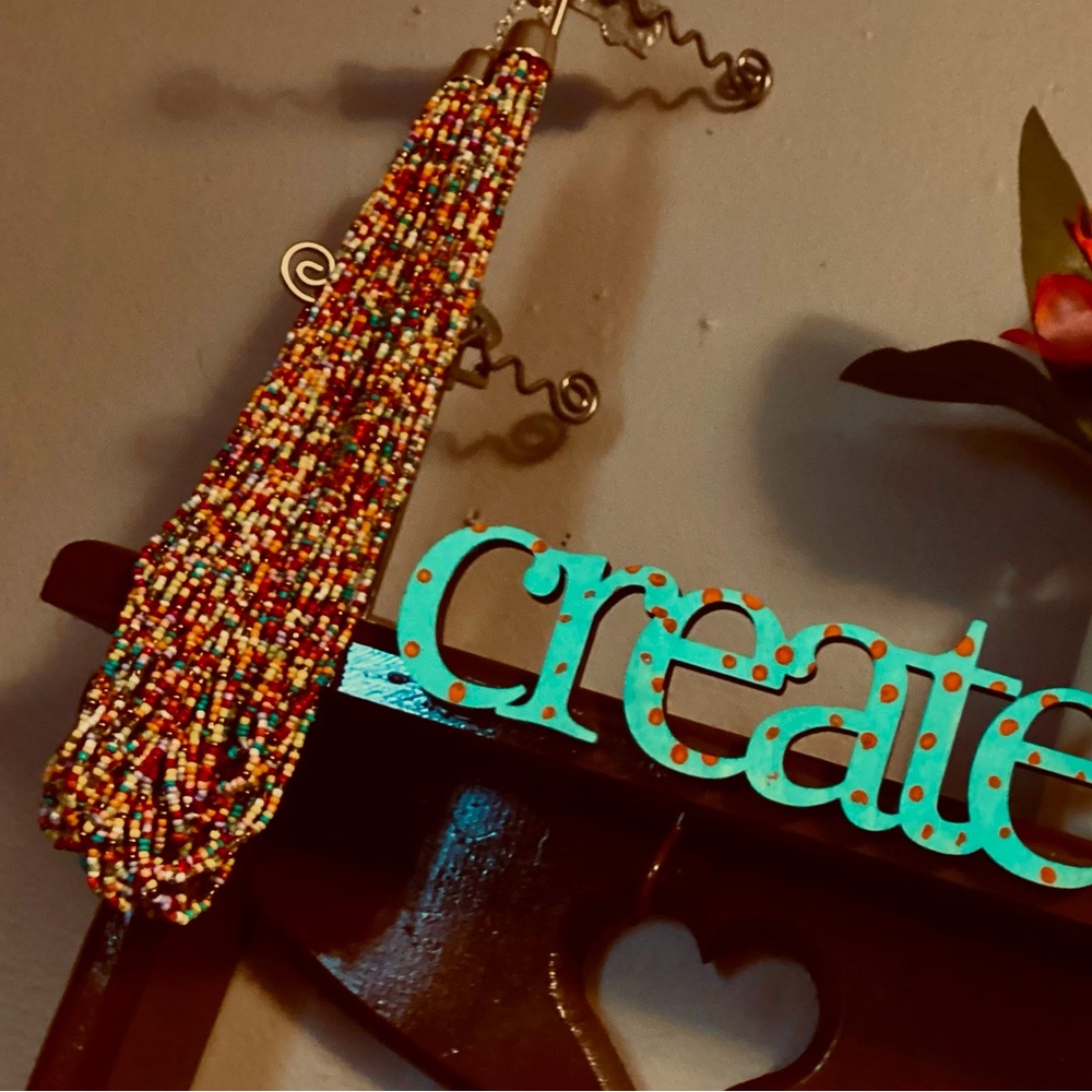 Multi colored beaded necklace bought from a storage unit w other jewelry.